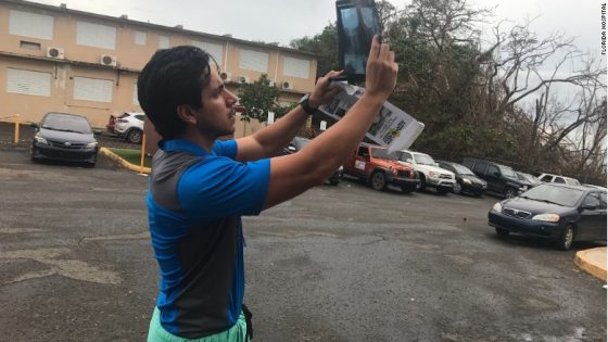 Dr. Trivino must use sunlight to examine x-rays since electricity is sporadic in Puerto Rico. 