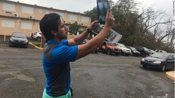 Dr. Trivino must use sunlight to examine x-rays since electricity is sporadic in Puerto Rico.
