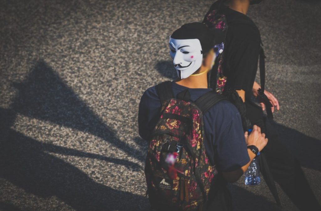 Anonymous: Hong Kong Defies Face Covering Ban with Joker, Winnie The Pooh and Guy Fawkes Masks To Protest Chinese Mafia And Police